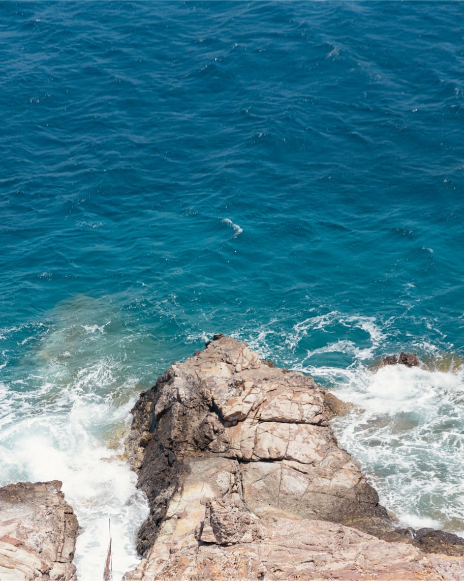 waves crashing into rocks